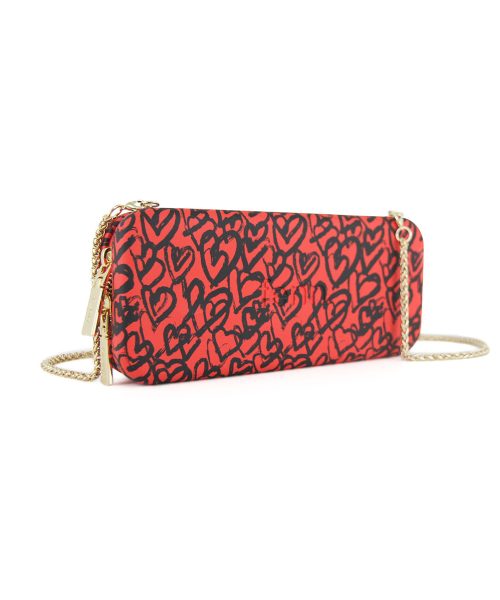 Tangerine Heart Wallet made from vinyl with a canvas interior, and has space for 8 cards