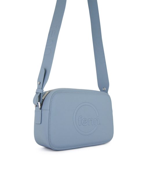 Mint Blue Sling Bag with an outside zip and inside pouch, it's water resistant and has an adjustable strap