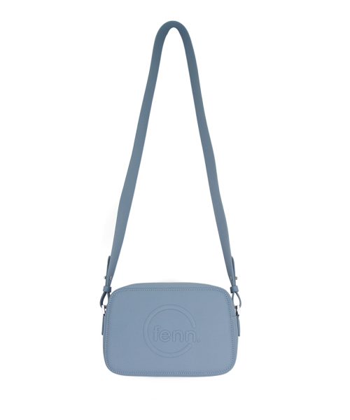 Mint Blue Sling Bag with an outside zip and inside pouch, it's water resistant and has an adjustable strap