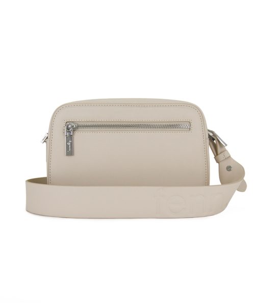 White Sling Bag with an outside zip and inside pouch, it's water resistant and has an adjustable strap