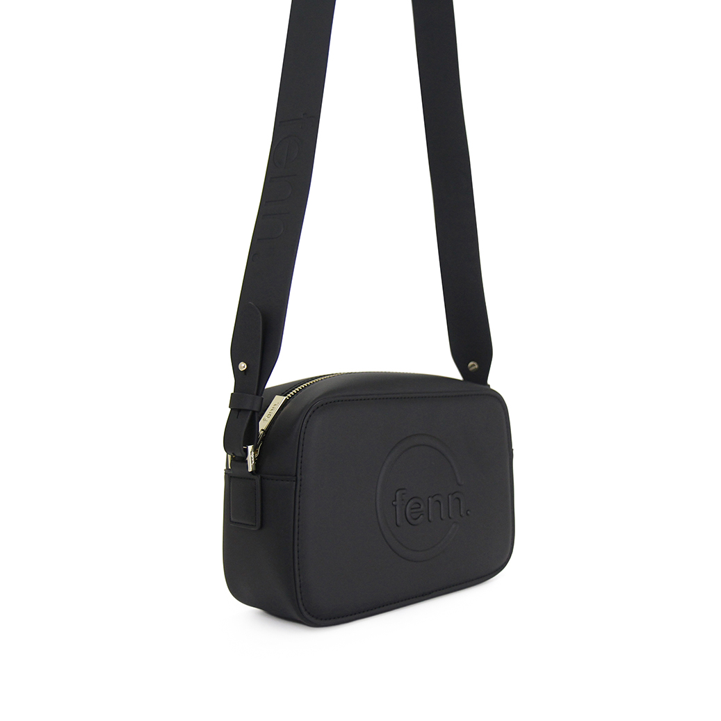 018-005-gold-9 Black Sling Bag with an outside zip and inside pouch, it's water resistant and has an adjustable strap
