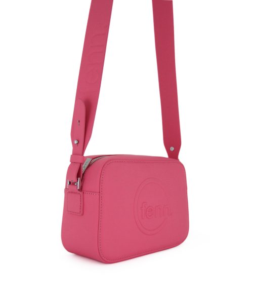 Cerise Sling Bag with an outside zip and inside pouch, it's water resistant and has an adjustable strap