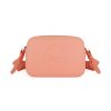 Salmon Sling Bag with an outside zip and inside pouch, it's water resistant and has an adjustable strap