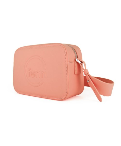 Salmon Sling Bag with an outside zip and inside pouch, it's water resistant and has an adjustable strap