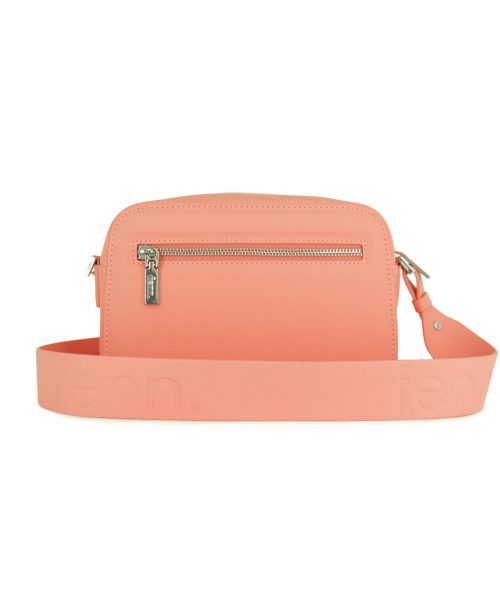 Salmon Sling Bag with an outside zip and inside pouch, it's water resistant and has an adjustable strap