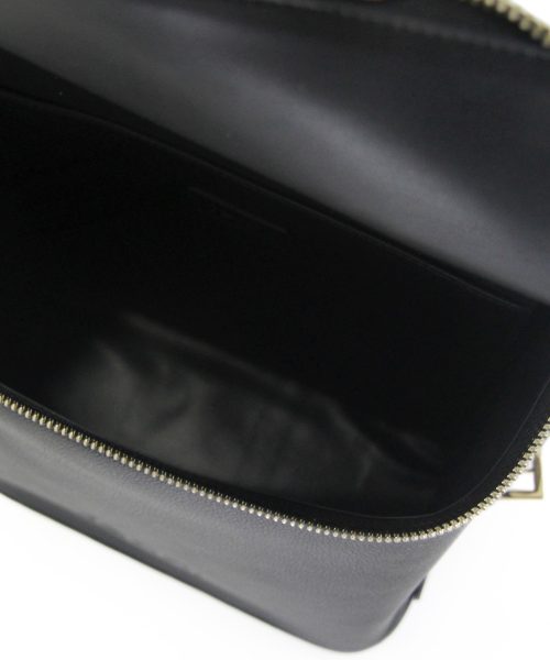 Black Backpack with an inside sleeve, soft vegan leather and adjustable straps