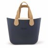 This Navy Tote Bag features a stunning vinyl exterior that exudes sophistication while the handles and inners are interchangeable