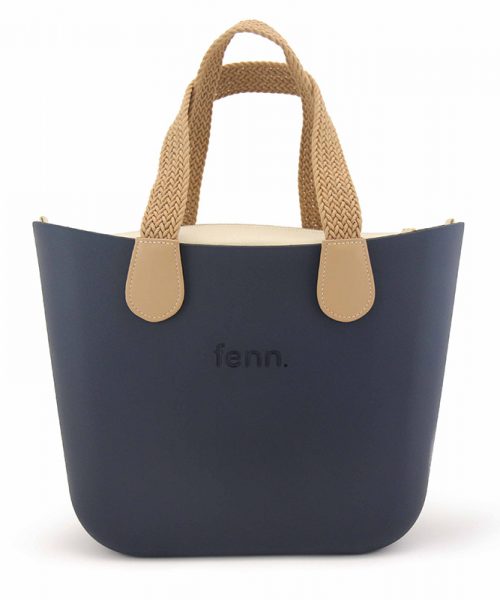 This Navy Tote Bag features a stunning vinyl exterior that exudes sophistication while the handles and inners are interchangeable