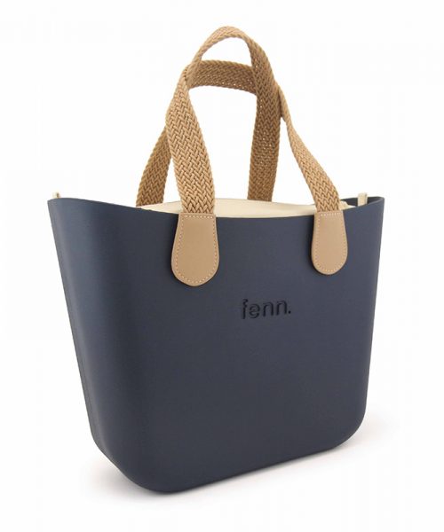 This Navy Tote Bag features a stunning vinyl exterior that exudes sophistication while the handles and inners are interchangeable