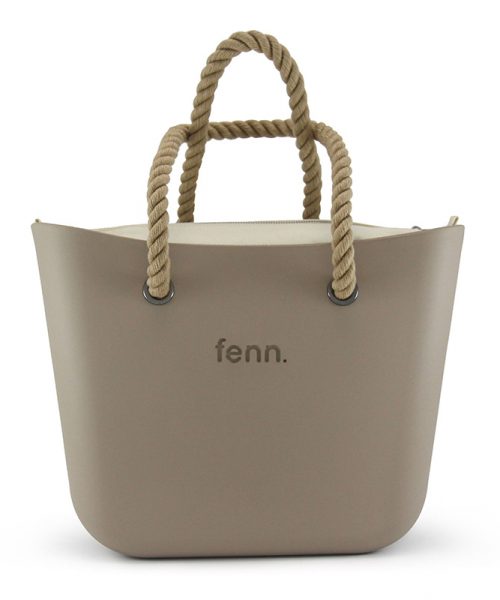 This Stone Tote Bag features a stunning vinyl exterior that exudes sophistication while the handles and inners are interchangeable