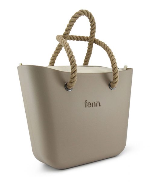 This Stone Tote Bag features a stunning vinyl exterior that exudes sophistication while the handles and inners are interchangeable