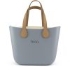 This Blue Haze Tote Bag features a stunning vinyl exterior that exudes sophistication while the handles and inners are interchangeable