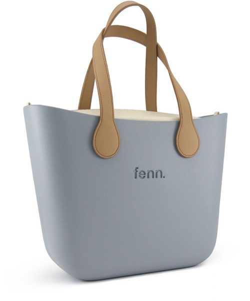 This Blue Haze Tote Bag features a stunning vinyl exterior that exudes sophistication while the handles and inners are interchangeable