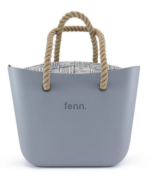 This Blue Haze Tote Bag features a stunning vinyl exterior that exudes sophistication while the handles and inners are interchangeable