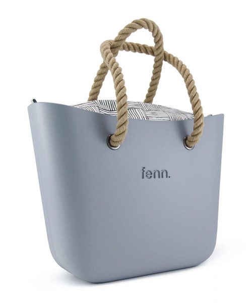 This Blue Haze Tote Bag features a stunning vinyl exterior that exudes sophistication while the handles and inners are interchangeable