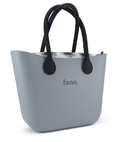 This Blue Haze Tote Bag features a stunning vinyl exterior that exudes sophistication while the handles and inners are interchangeable
