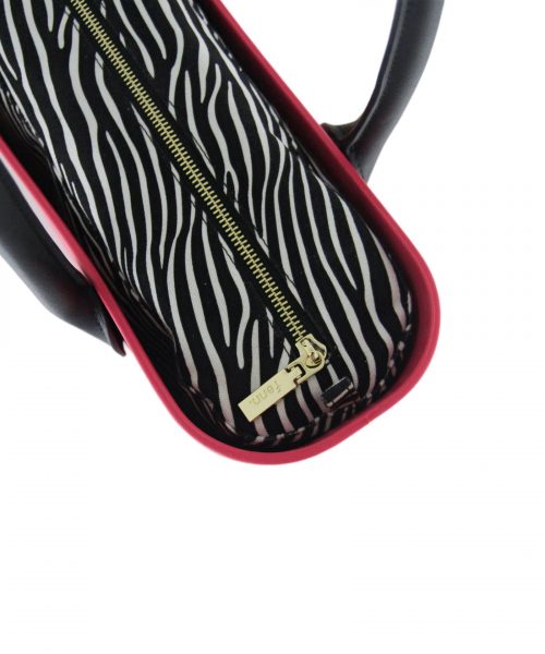 This Fushia Tote Bag features a stunning vinyl exterior that exudes sophistication while the handles and inners are interchangeable