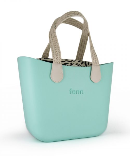 This Turquoise Tote Bag features a stunning vinyl exterior that exudes sophistication while the handles and inners are interchangeable