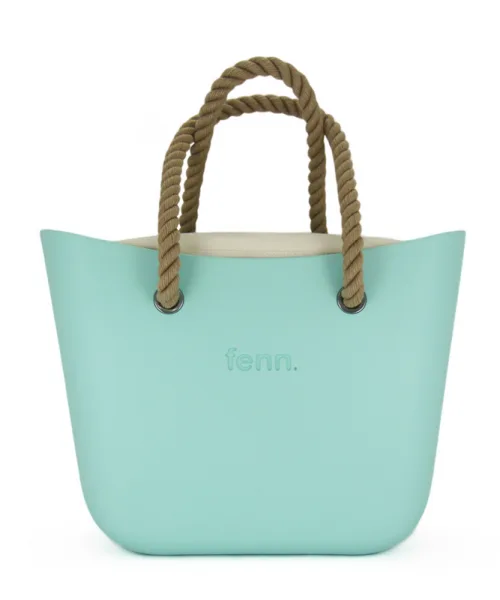 This Turquoise Tote Bag features a stunning vinyl exterior that exudes sophistication while the handles and inners are interchangeable