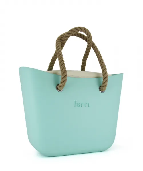 This Turquoise Tote Bag features a stunning vinyl exterior that exudes sophistication while the handles and inners are interchangeable