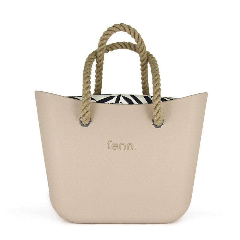 1140-1 This Sand Tote Bag features a stunning vinyl exterior that exudes sophistication while the handles and inners are interchangeable