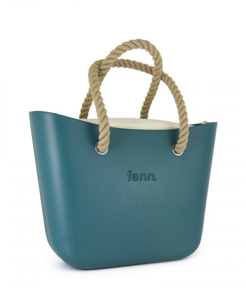 This Teal Tote Bag features a stunning vinyl exterior that exudes sophistication while the handles and inners are interchangeable