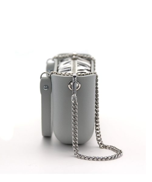 Grey Shoulder Bag with a vinyl exterior, removable canvas-lined interior and an adjustable chained strap