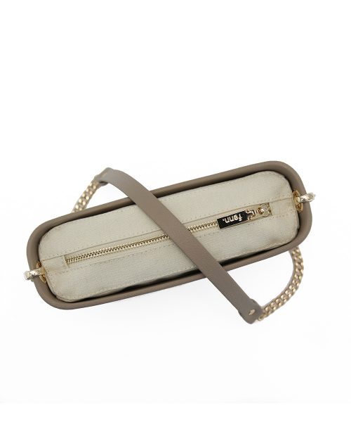 Stone Shoulder Bag with a vinyl exterior, removable canvas-lined interior and an adjustable chained strap
