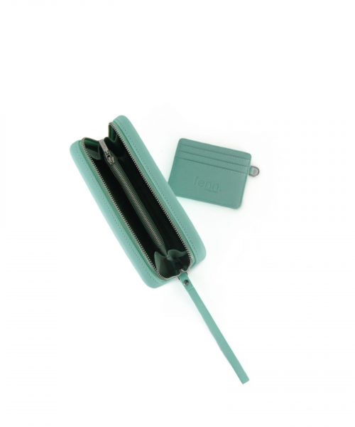 Turquoise Wallet made from vinyl with a canvas interior, and has space for 8 cards