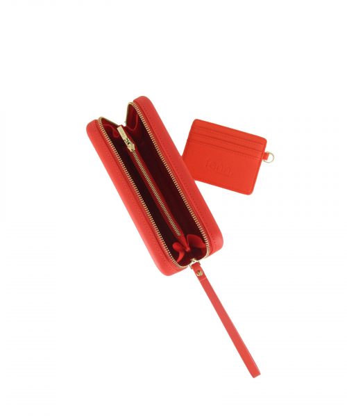 Tangerine Red Wallet made from vinyl with a canvas interior, and has space for 8 cards