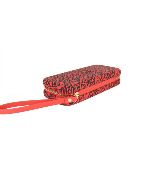 Tangerine Heart Wallet made from vinyl with a canvas interior, and has space for 8 cards