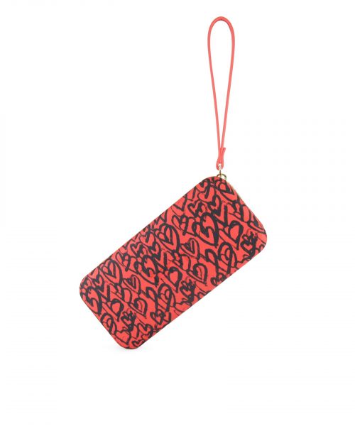 Tangerine Heart Wallet made from vinyl with a canvas interior, and has space for 8 cards