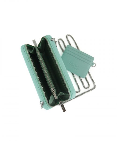Turquoise Wallet made from vinyl with a canvas interior, and has space for 8 cards