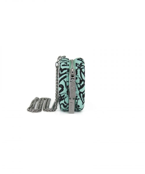 Turquoise Heart Wallet made from vinyl with a canvas interior, and has space for 8 cards
