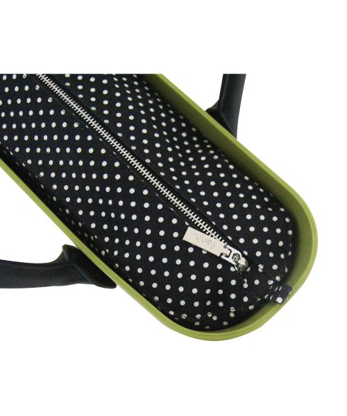 This Lime Tote Bag features a stunning vinyl exterior that exudes sophistication while the handles and inners are interchangeable