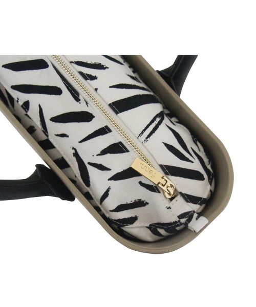 This Stone Tote Bag features a stunning vinyl exterior that exudes sophistication while the handles and inners are interchangeable
