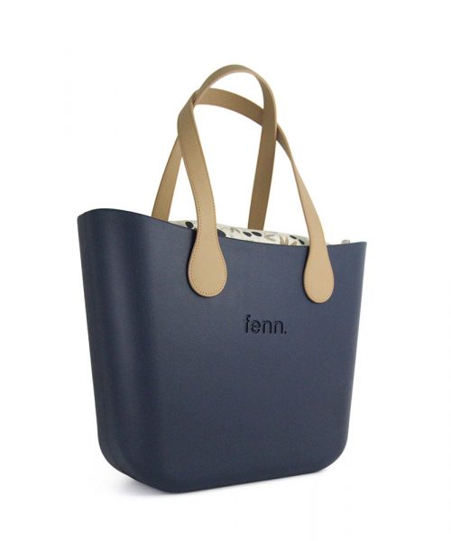 This Navy Tote Bag features a stunning vinyl exterior that exudes sophistication while the handles and inners are interchangeable